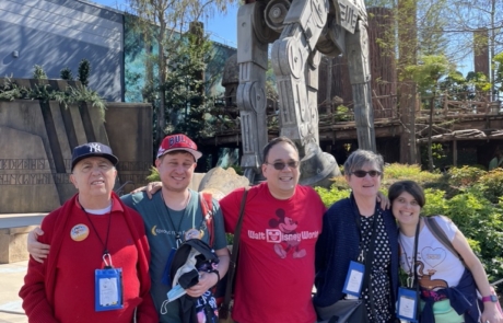 Highlight Vacations standing in front of AT-AT Walker from Star Wars