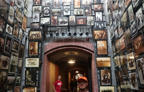 Highlight Vacations traveler in the photo room at the National Holocaust Museum in DC