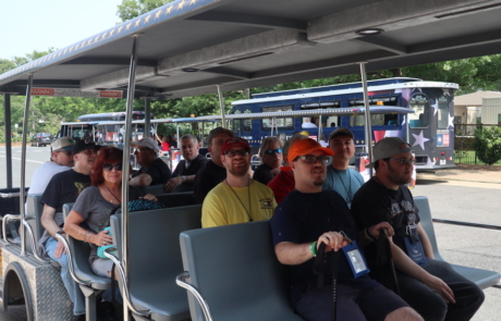 Highlight Vacations travelers & staff on the Hop on, Hop off trolley at the Arlington National Cemetery.