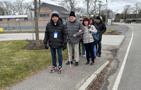 travelers and staff are out for a walk