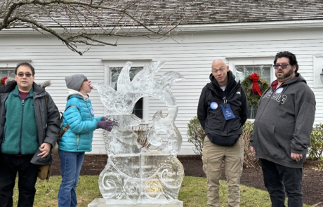 Travelers with ice sculpture