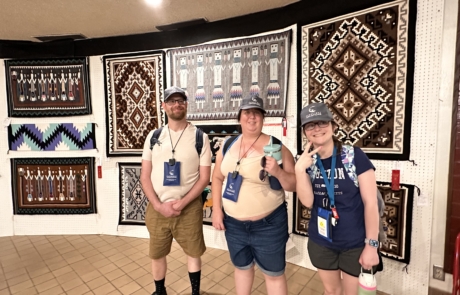 Travelers in the Rug exhibit. Each rug is hand made.