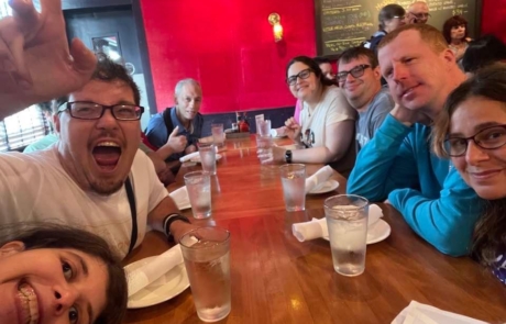 travelers sitting at dinner table.