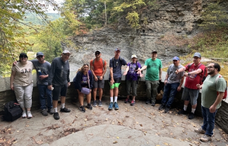 Travelers at Buttermilk Falls State Park on one of the trails.