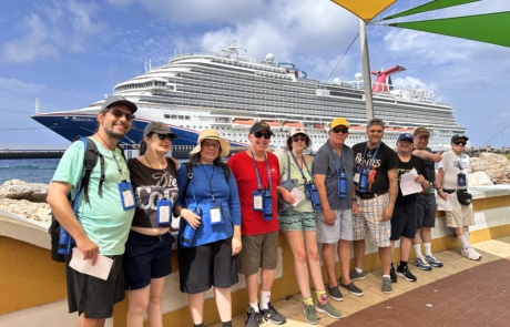 IMG_3008 Travelers standing with the ship, Carnival Horizon in the background