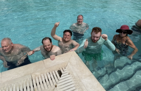 IMG_5665 Travelers and staff swimming at Resort pool in Curacao