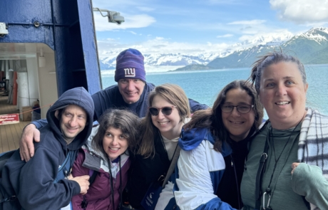 Travelers on deck with Hubbard Glacier in the background