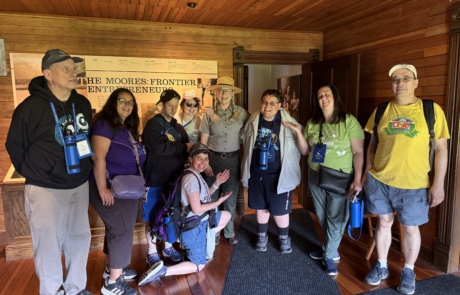 Travelers with Ranger Kim at the Moore's Homestead.