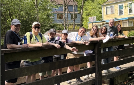 Travelers on the Harris Street Bridge in Ketchikan, Alaska on the Salmon walk