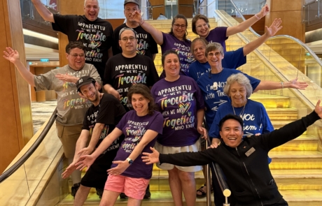 Your travelers and staff on the Celebrity Summit with crew member Marvin