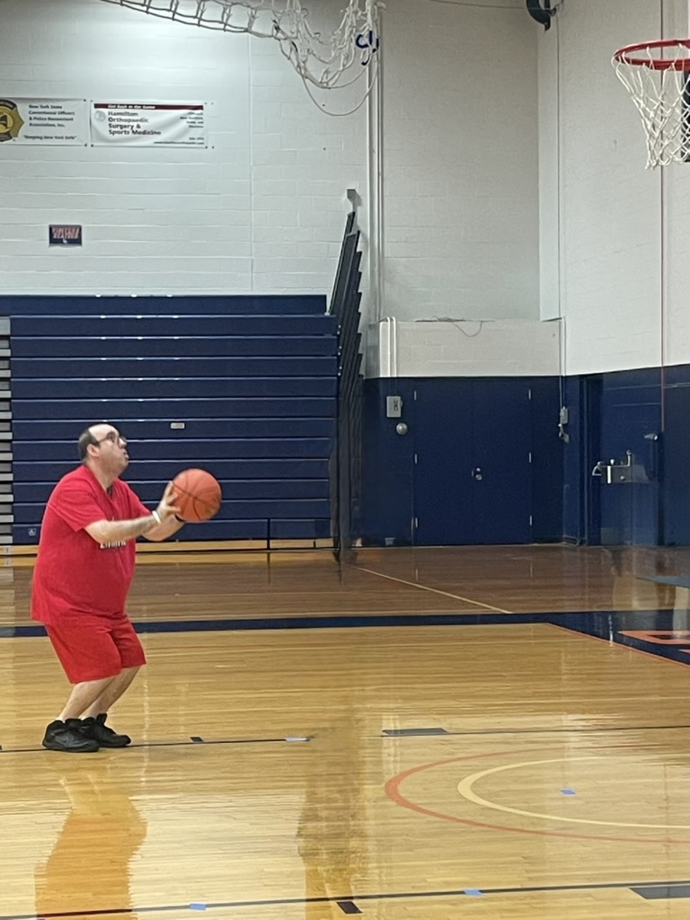 traveler showing his shooting skills at Special Olympics New York.